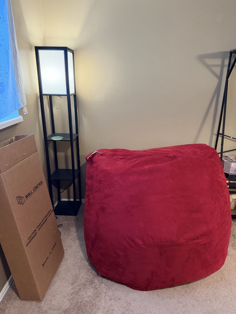 Large red beanbag chair.