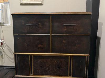 Dark Wood Cabinet with Gold Accents