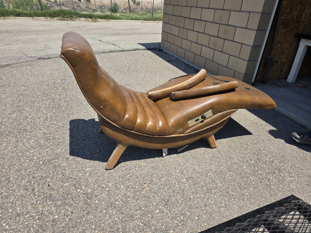 Vintage Mid-Century Modern Brown Vinyl electric Reclining Chaise Lounge Chair. previously used for tattooing.