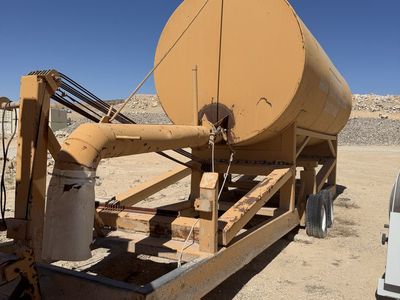 Large Yellow water stand Tank Trailer, Appears to be a Water Tank for Commercial/Construction Use