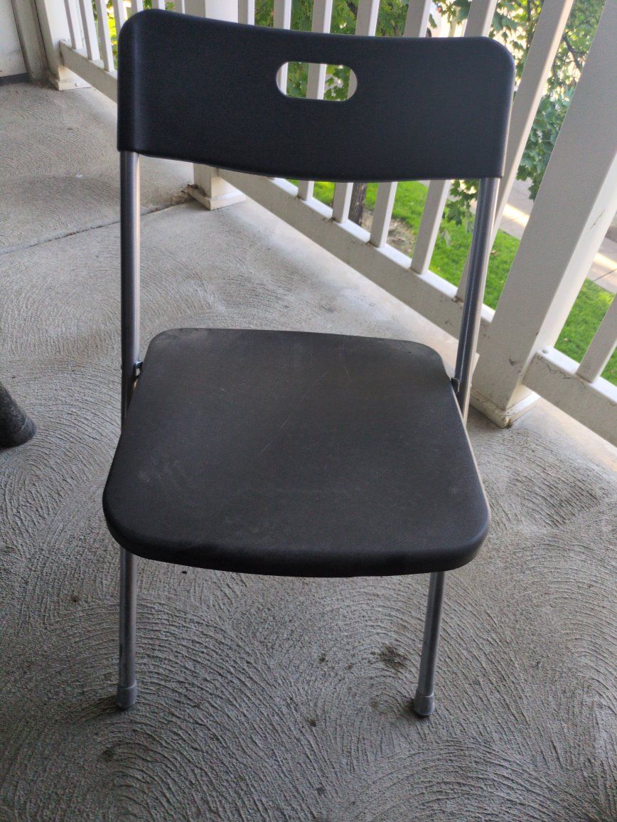 black folding chair