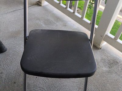 black folding chair
