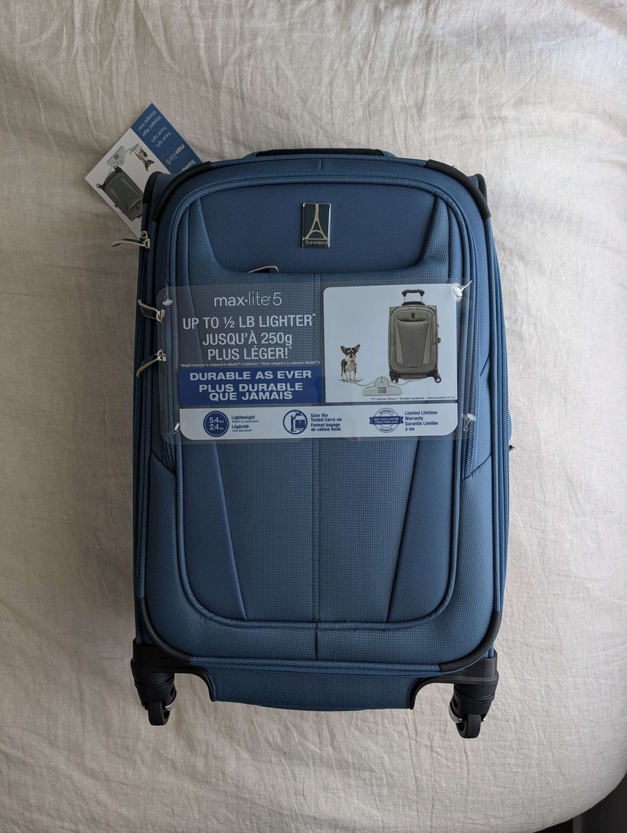 Travelpro Maxlite 5 Softside Carry-on luggage (1 new, 1 used)