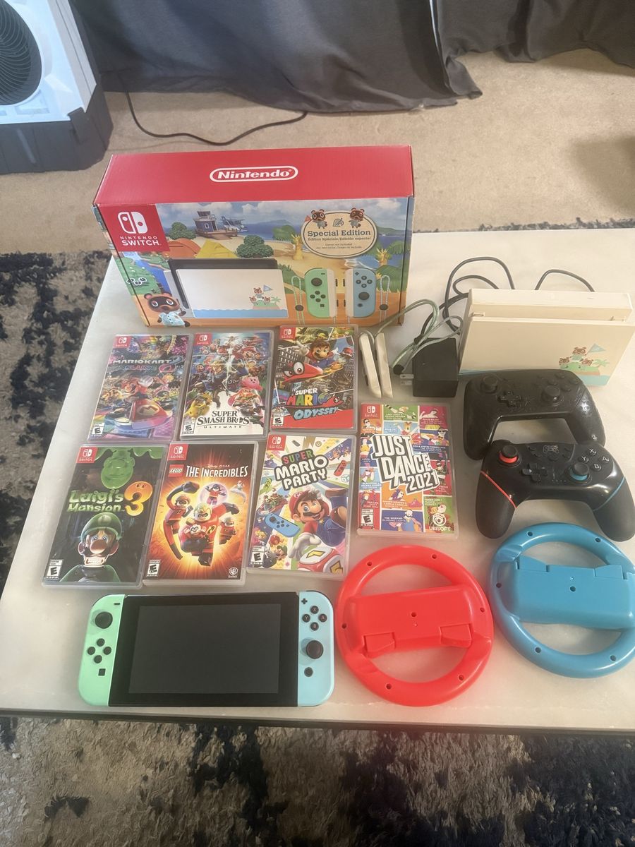 Nintendo Switch Special Edition Console Bundle w/ 8 Games, 2 Pro Controllers, Steering Wheels 16 Gb SD Card