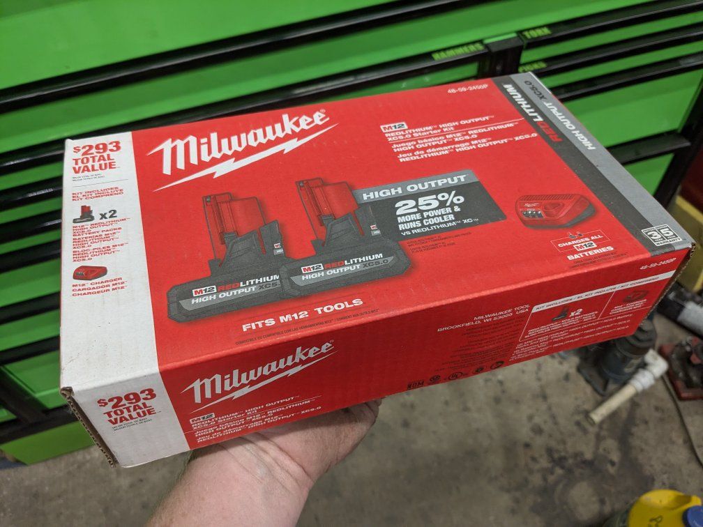 2x Milwaukee m12 5.0ah battery high output charger