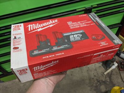 2x Milwaukee m12 5.0ah battery high output charger