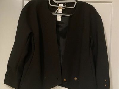Trina Turk black blazer with gold lapel buttons an