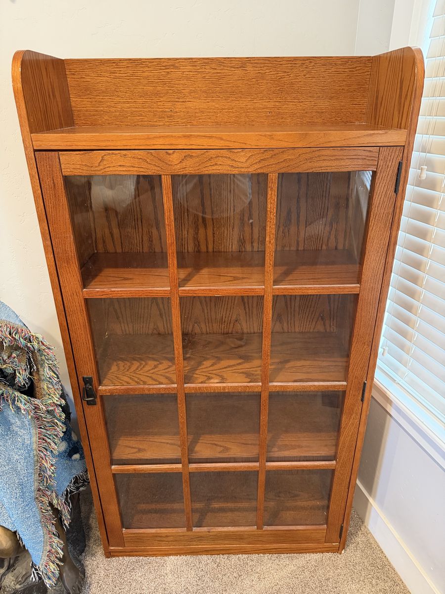 Storage cabinet with glass door
