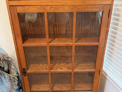Storage cabinet with glass door