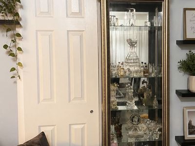 Tall Black and Gold Glass Curio Cabinet Display Case