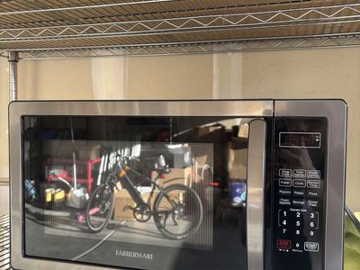 Farberware 1.1 cu ft 1000W Stainless Steel Countertop Microwave Oven