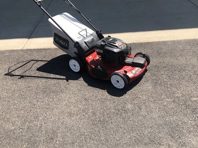 SELF PROPELLED TORO LAWN MOWER WITH A BRIGGS & STRATTON ENGINE