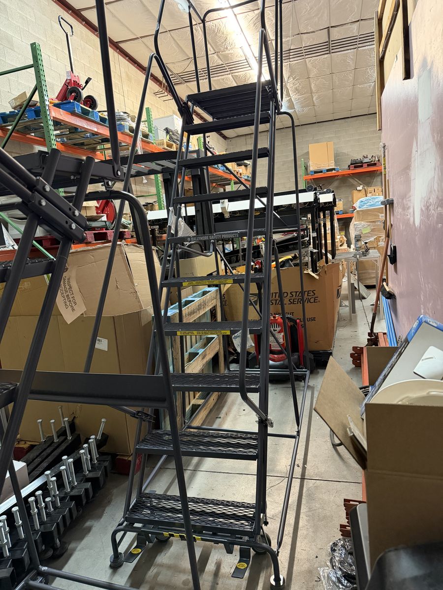 New (damaged) 10 Step Rolling Platform Warehouse Ladder