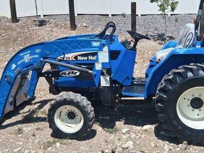 New Holland TC30 tractor loader.