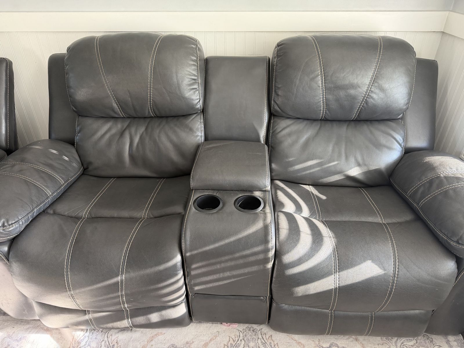 Dark Grey Pleather Reclining Sofa and Loveseat Set with Cup Holders - Good Condition.