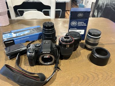 Pentax KS2 DLSR Camera with Various Lenses, Mic, and Spare Batteries