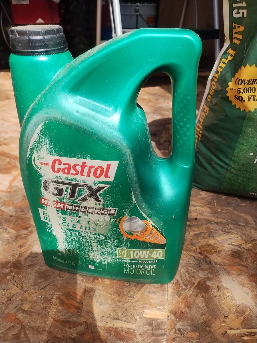 Motor oil, Castrol high milage synthetic blend 10W40, 3 Quarts