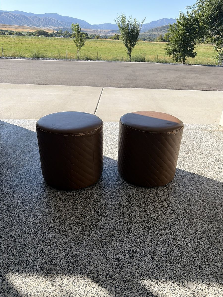 Set of 2 Brown Round Faux Leather Tufted Ottomans / Poufs