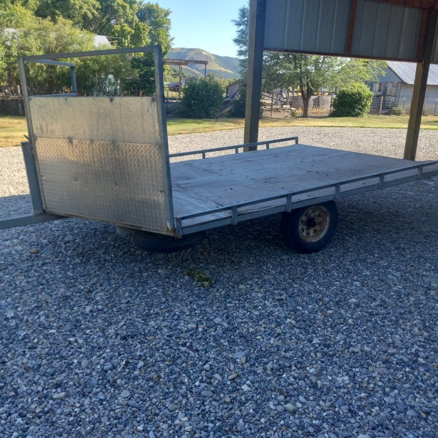 Utility Trailer - Flatbed, Single Axle, Steel Frame, Wood Deck, with Ramps