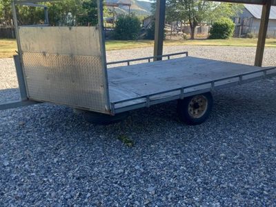 Utility Trailer - Flatbed, Single Axle, Steel Frame, Wood Deck, with Ramps
