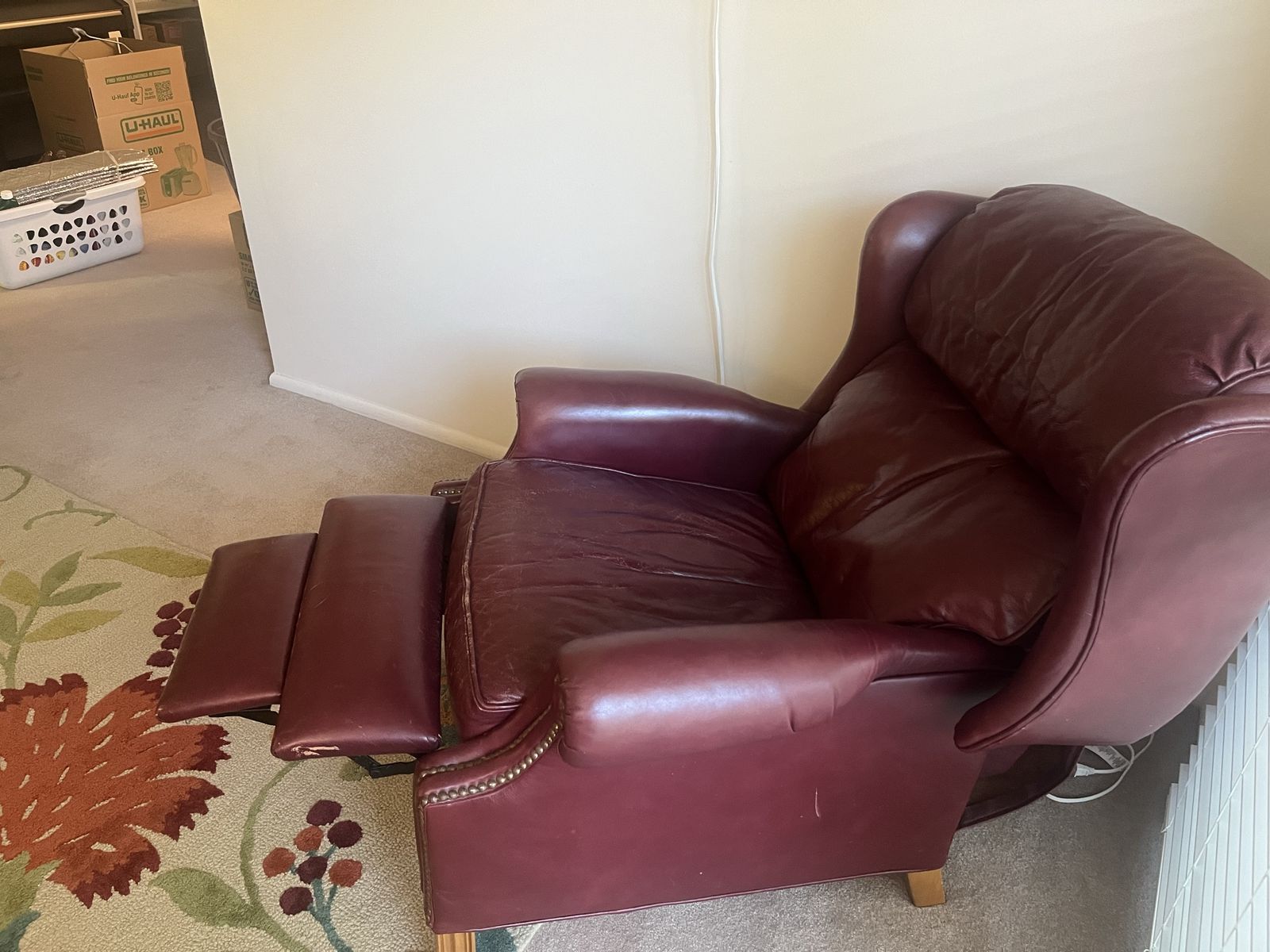 Wing back leather recliner