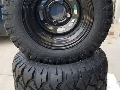 Steeleng 18"x9"-10" Stinger P3090 ATV/UTV/Golf Cart Tire on Black Slotted Steel Wheel 10"x7"