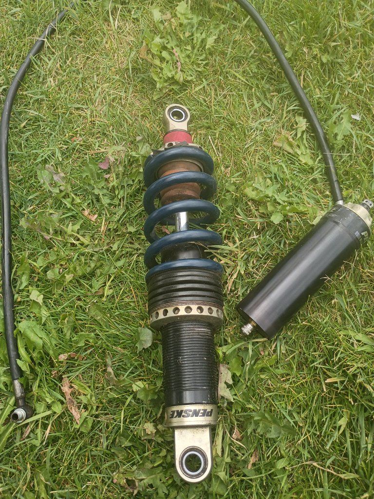 4 Penske Racing Suspension Shock Absorber with Remote Reservoir only asking $650
