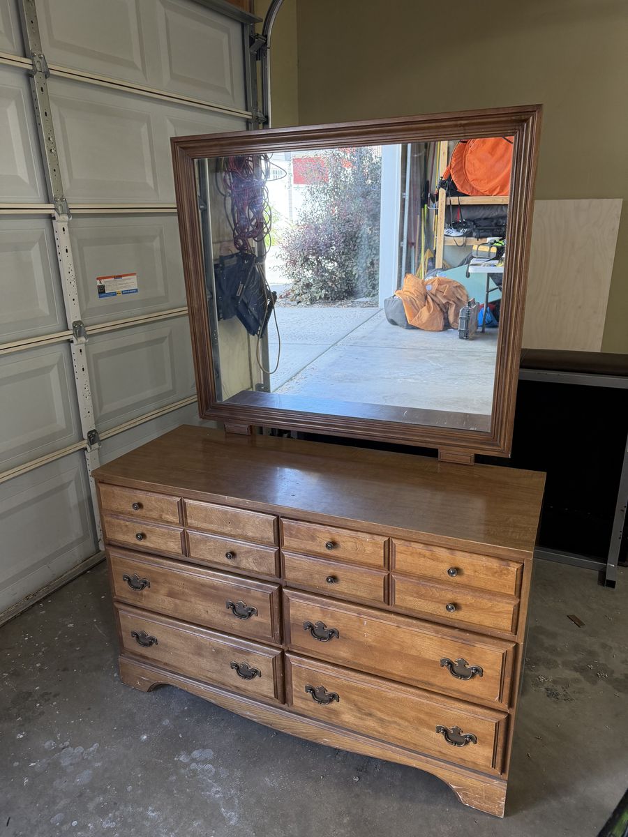 Dresser with attached mirror