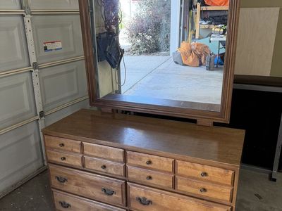 Dresser with attached mirror