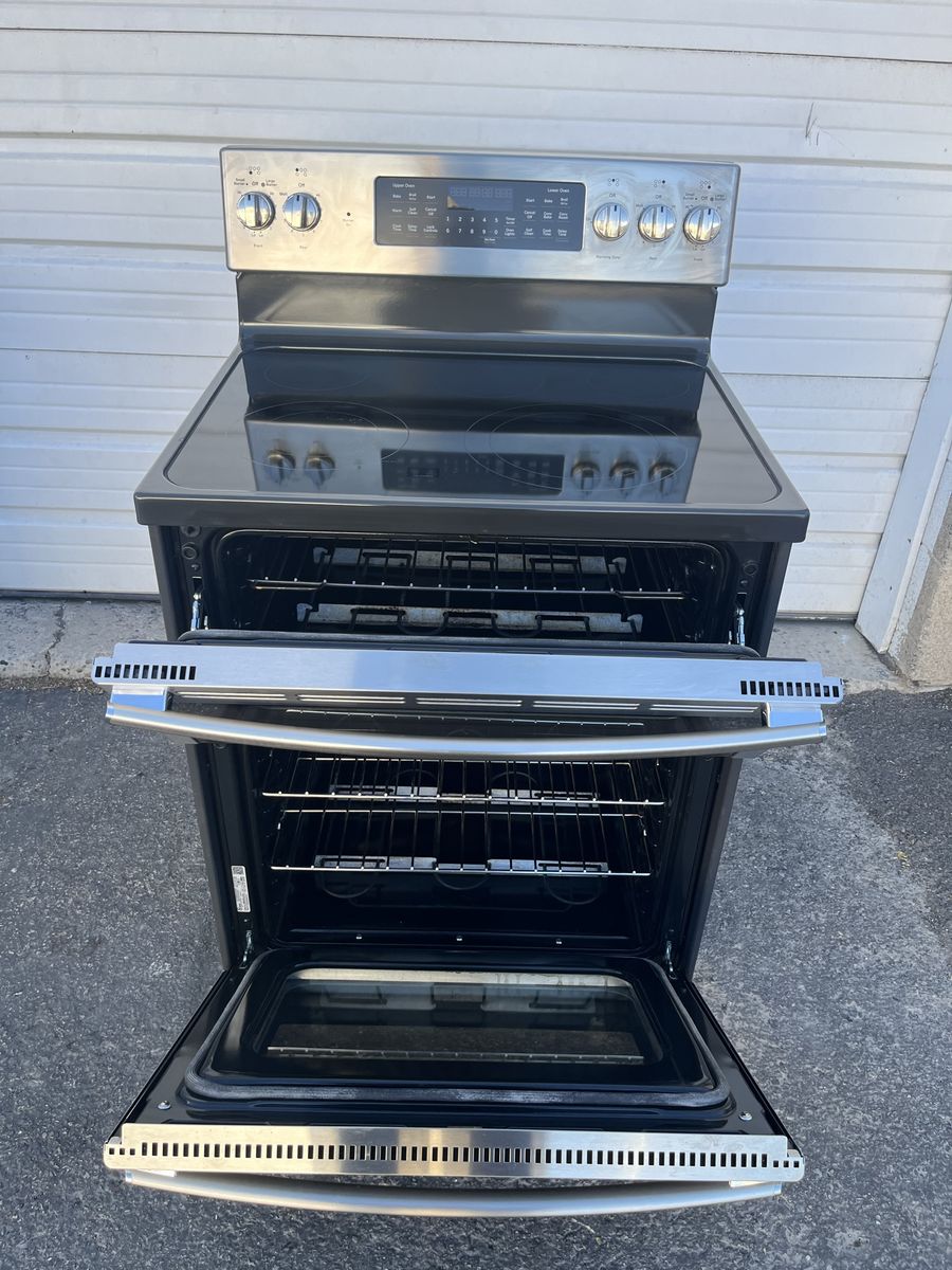 beautiful GE SS double oven electric range,free delivery