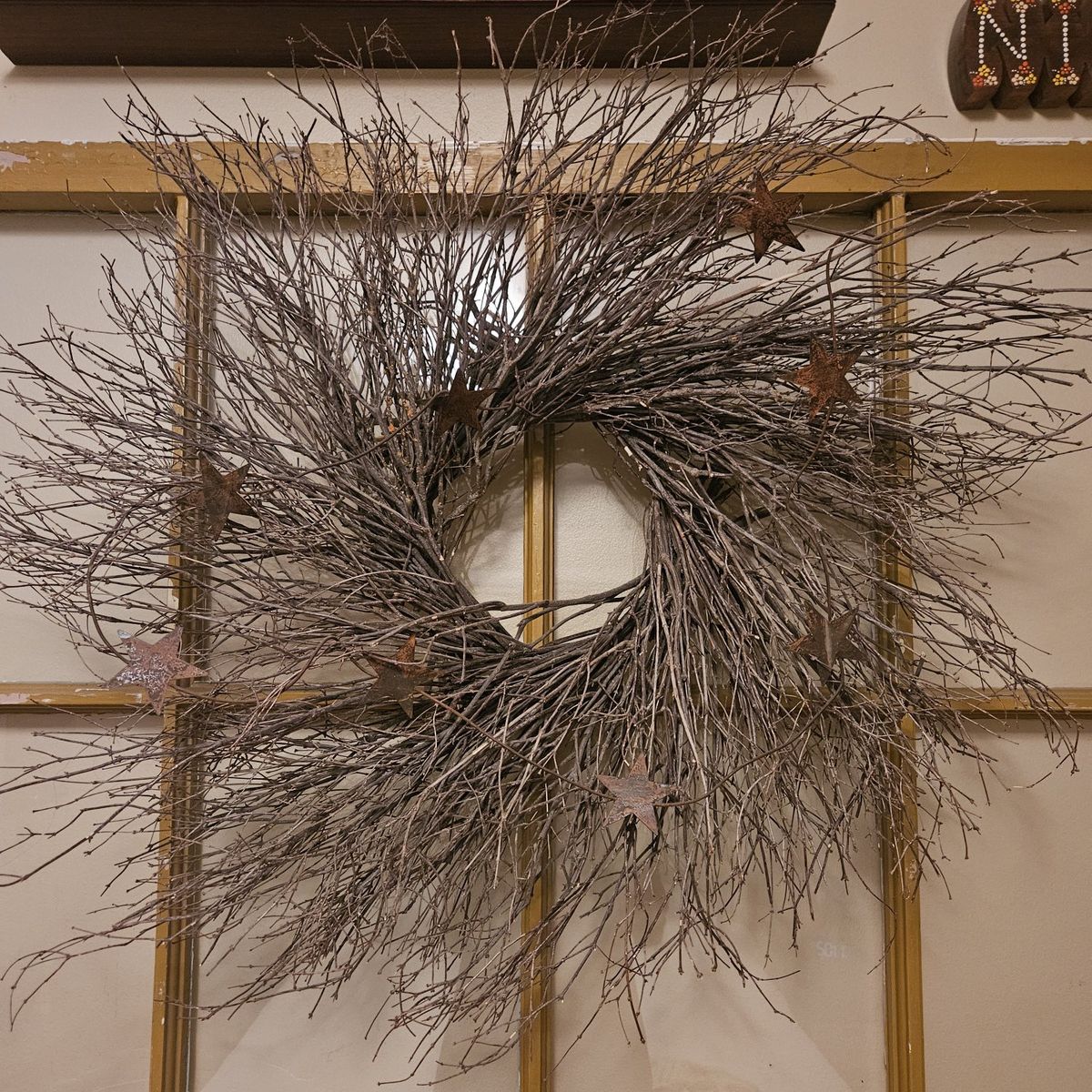 Twig wreath with metal stars