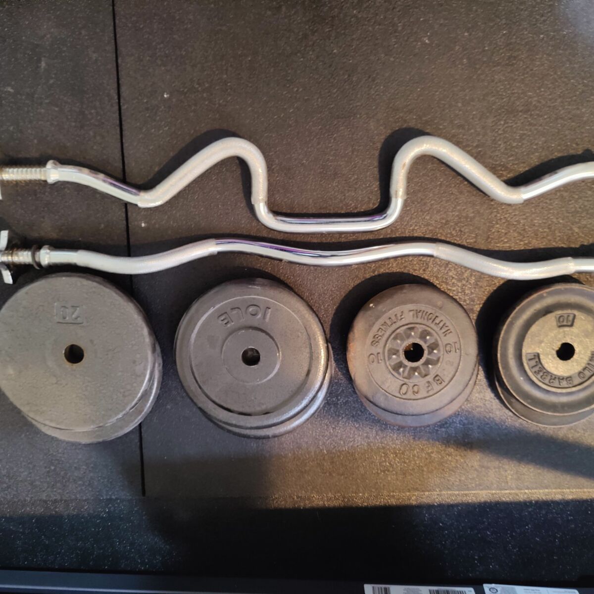 2 curl bars with 100lb of weight