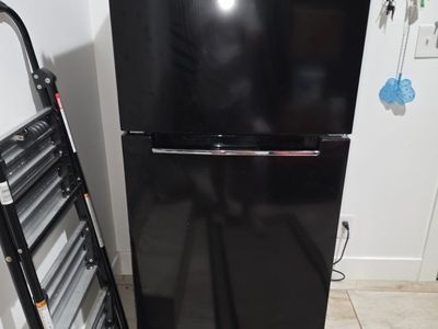 Magic Chef Black Top Freezer Refrigerator.