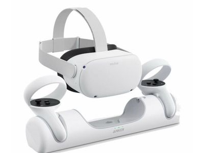 2 Meta Quest 2 VR Headsets + Controllers & Charging Base