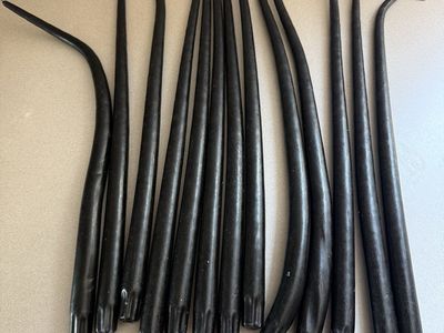 Set of long taper candles 18” T $25 all. Some tweaked in the sun!