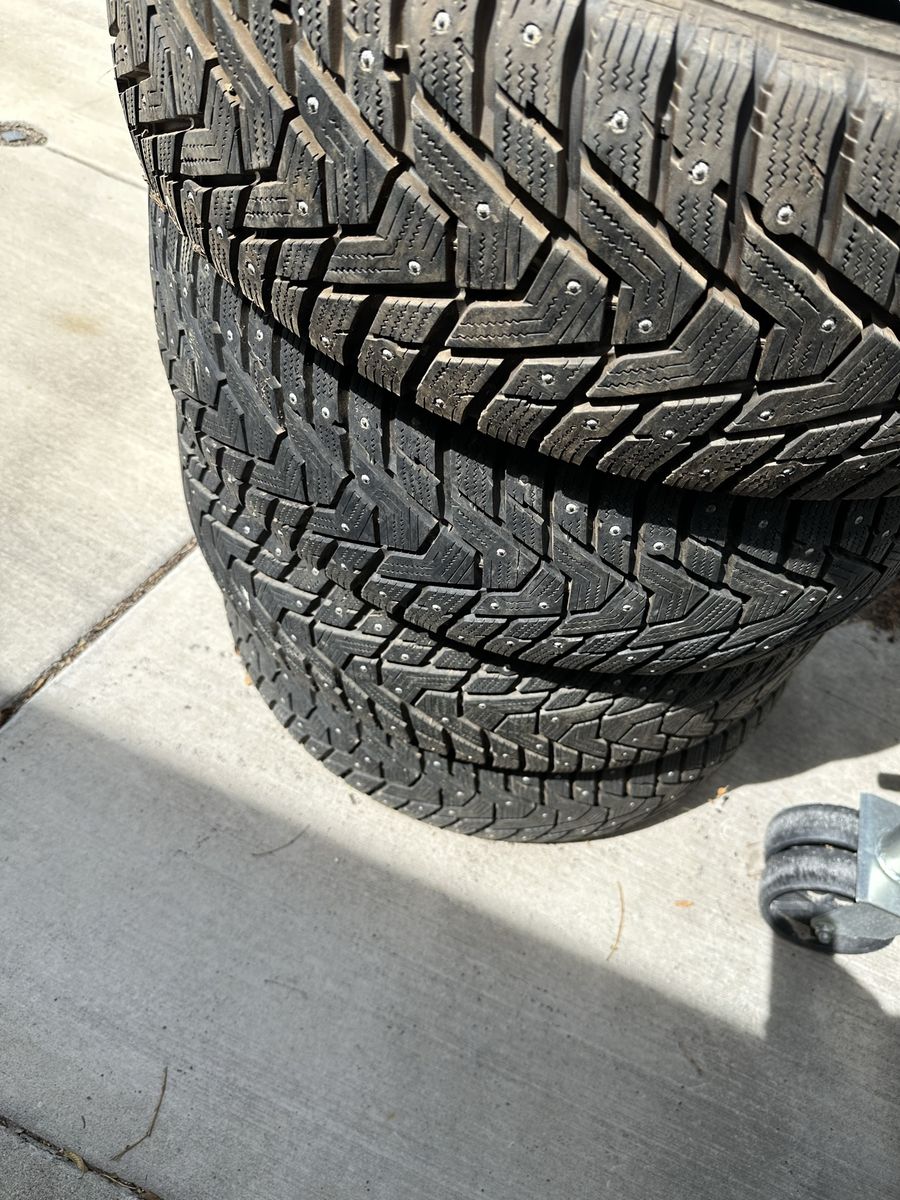 Nearly New Studded Snow Tires