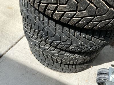 Nearly New Studded Snow Tires