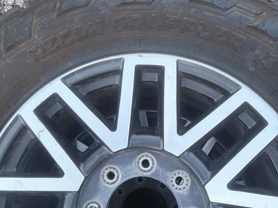 Nitto Recon Grappler A/T Tires on 20" Wheels - 35X12.50R20LT Set of 4
