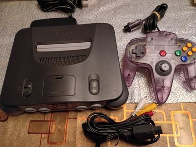 Nintendo 64 N64 Console with Clear Purple Controller, Power Supply, and A/V Cables