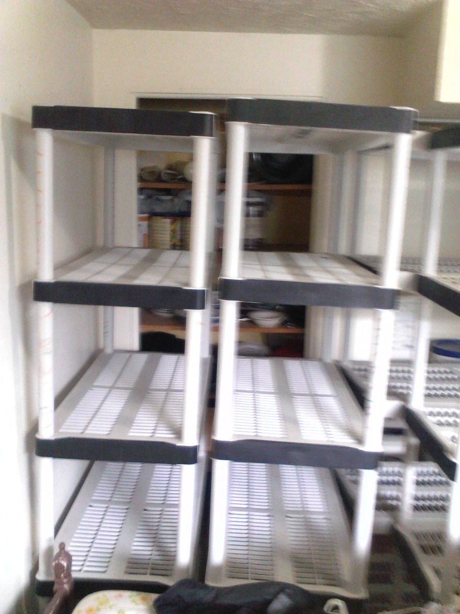 A Total Set of 4, 5 Tier Plastic Shelves, Pre Owned