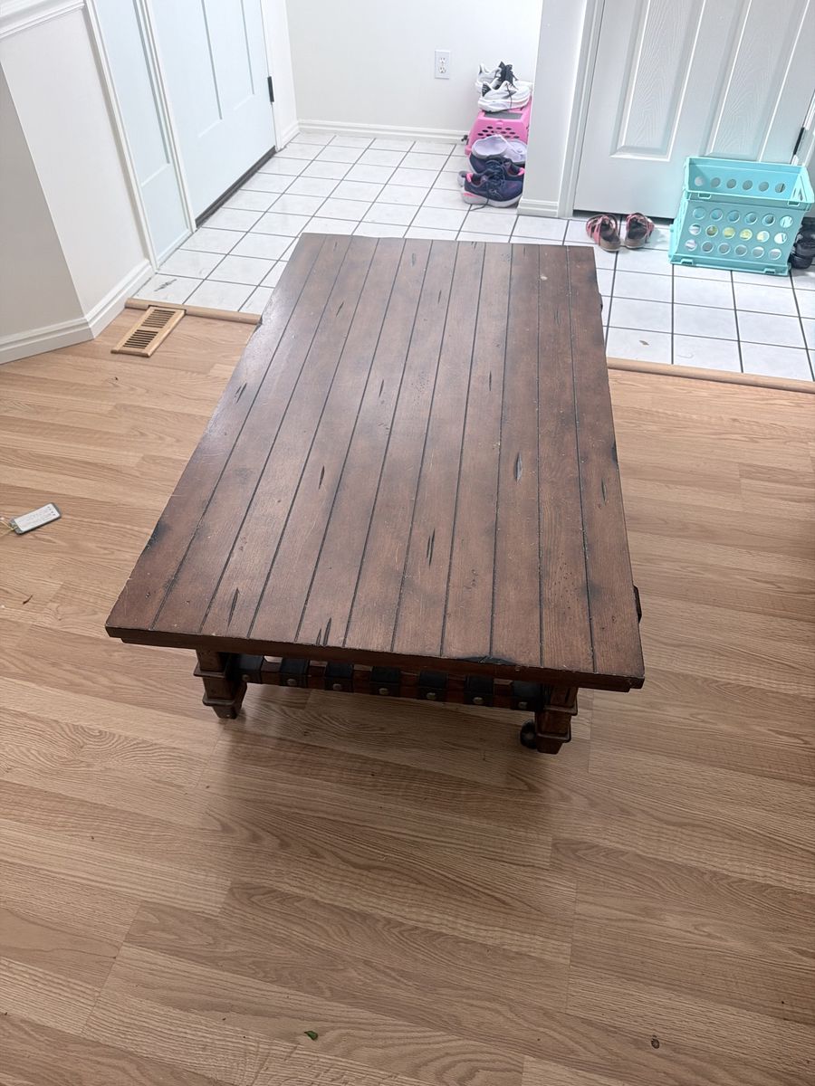 Rustic Wood Coffee Table with Caster Wheels and Woven Lower Shelf