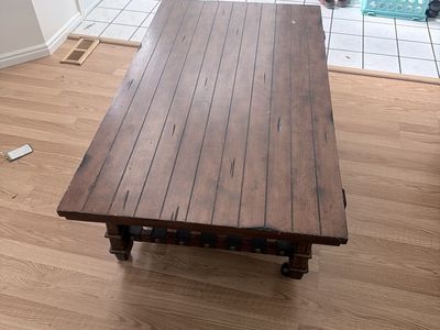 Rustic Wood Coffee Table with Caster Wheels and Woven Lower Shelf