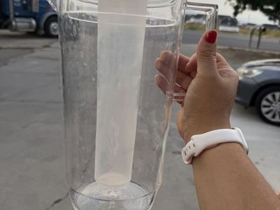 Clear Acrylic Beverage Pitcher with Removable Ice Core Insert