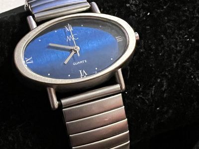 MC Quartz Oval Blue Dial Watch with Expandable Band - Used Condition