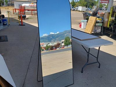 71 in X 26 in arched mirror