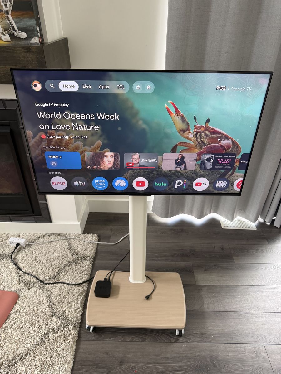 43” TCL TV and stand with wheels