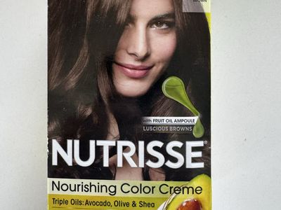 Garnier Nutrisse Nourishing Color Creme in the shade 413 Bronze Brown. $7.98