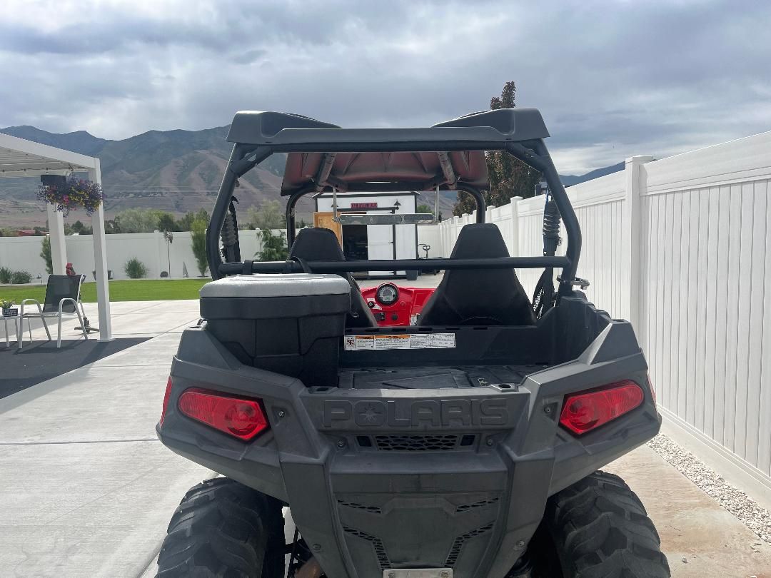 Polaris 2012 RZR 570 ESI side by side and 2008 utility trailer