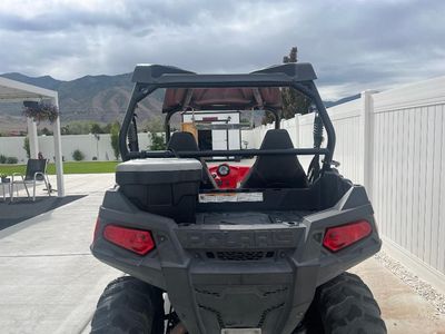 Polaris 2012 RZR 570 ESI side by side and 2008 utility trailer