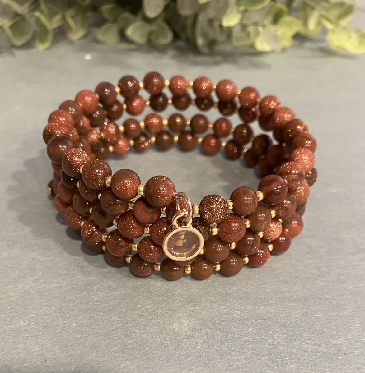 Gold Stone Beaded Coil Bracelet With Mustard Seed Charm